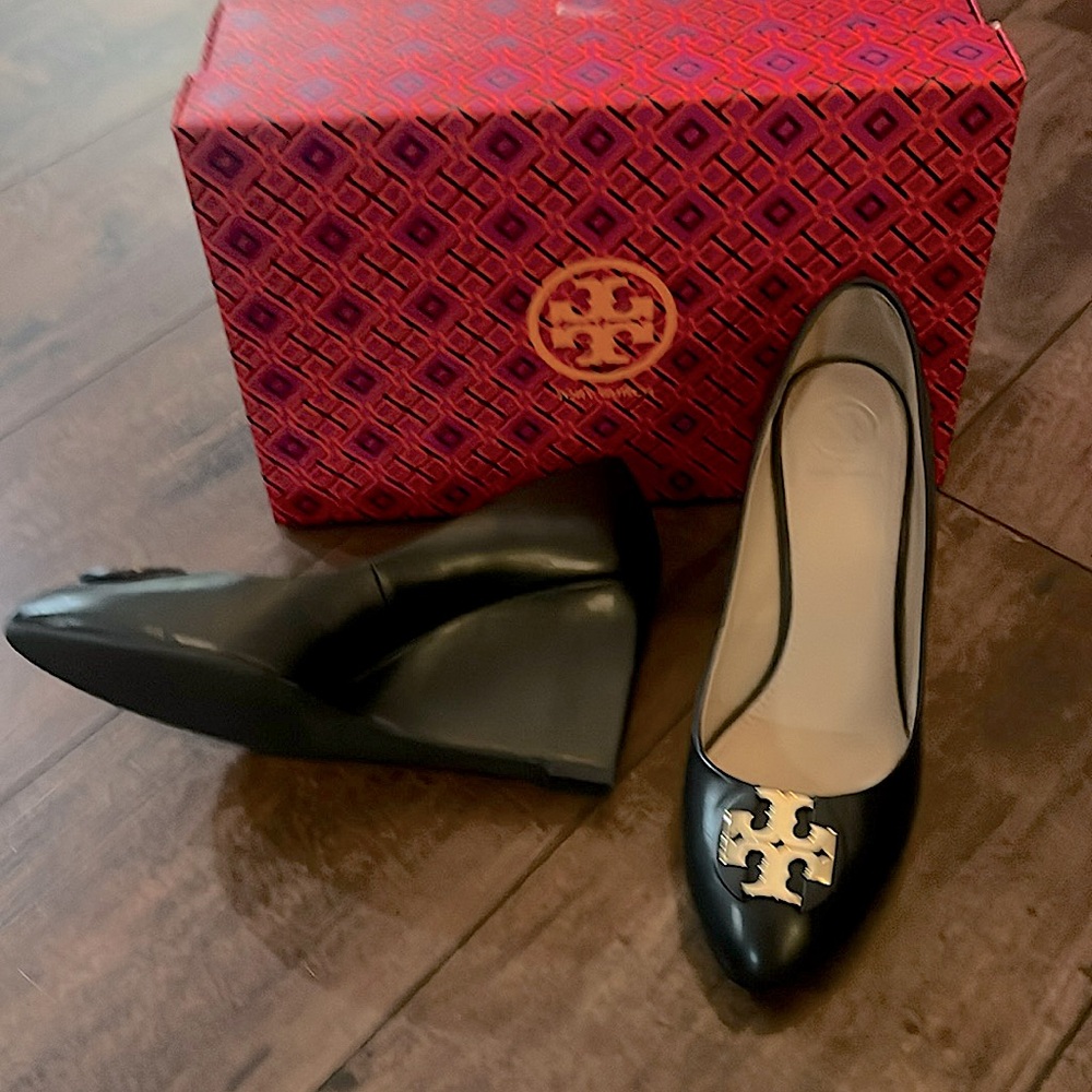 Gorgeous Tory Burch Black calfskin leather wedge. Size 8.5. True to size.